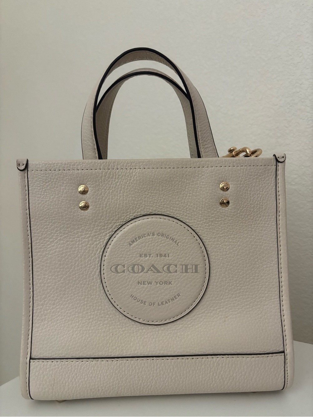 COACH Dempsey tote 22 pebble leather
